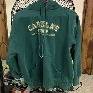 Green Cabela’s pullover hoodie.